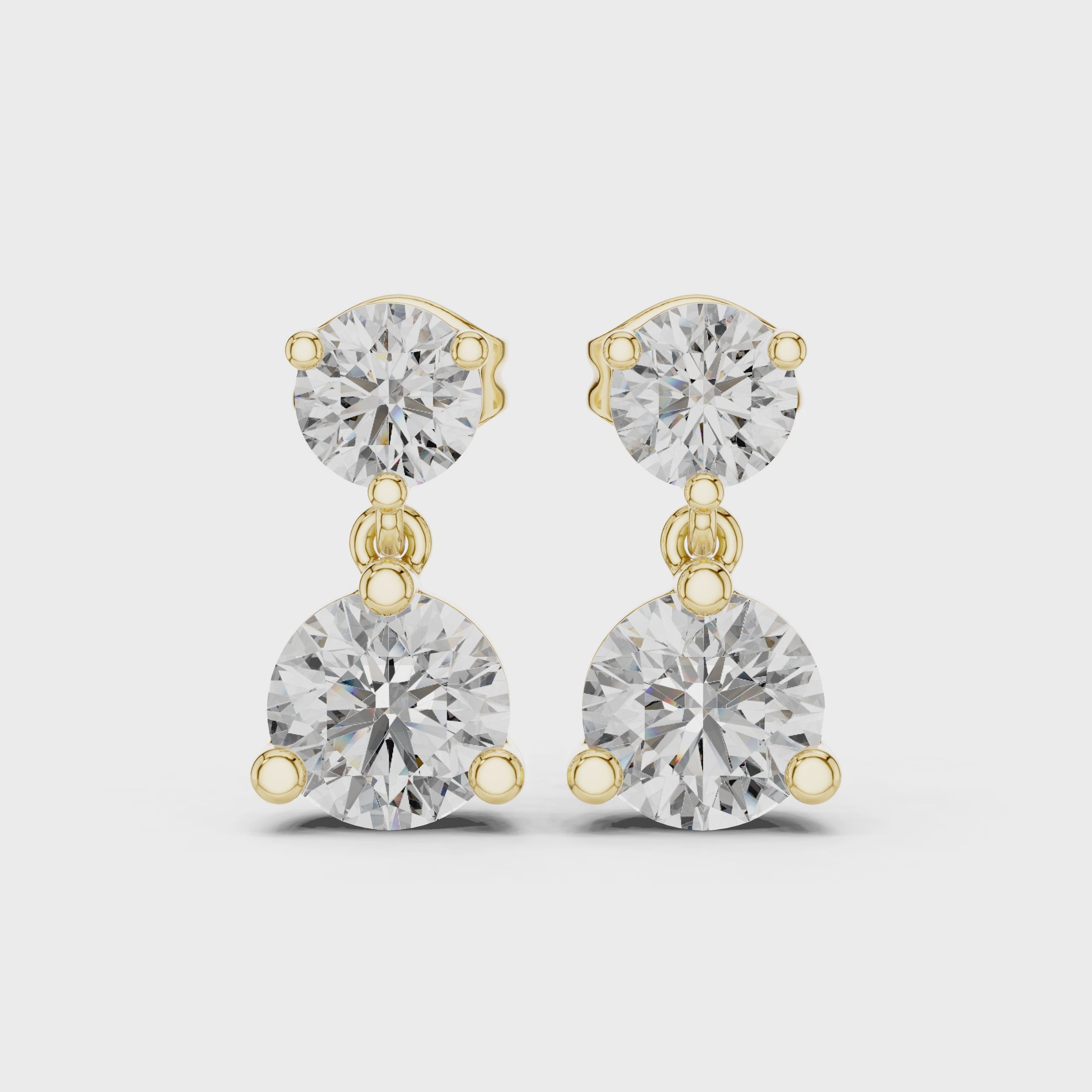 Just Off The Lobe Earrings turning, 18KT yellow gold
