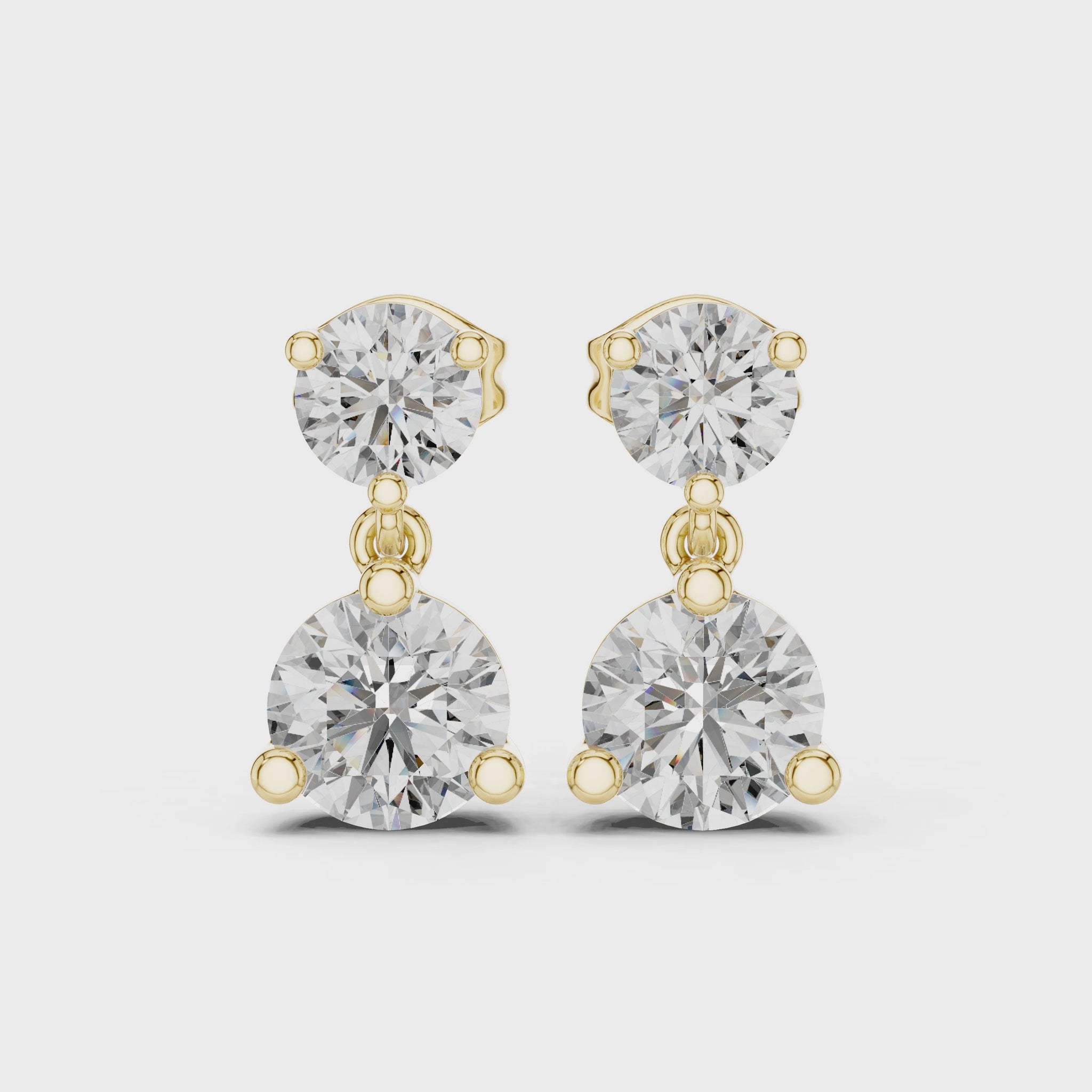 Just Off The Lobe Earrings turning, 18KT yellow gold